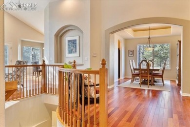 Exquisitely located on the edge of 22 acres of HOA owned forest on The Ridge At Castle Pines North in Colorado - for sale on GolfHomes.com, golf home, golf lot