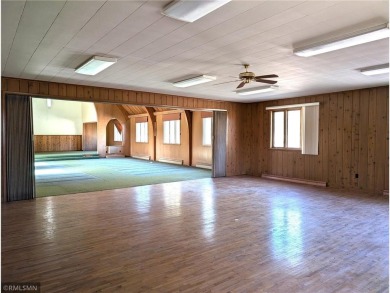 Formerly used as a church, this empty commercial zoned building on Long Prairie Country Club in Minnesota - for sale on GolfHomes.com, golf home, golf lot