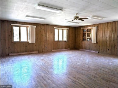 Formerly used as a church, this empty commercial zoned building on Long Prairie Country Club in Minnesota - for sale on GolfHomes.com, golf home, golf lot