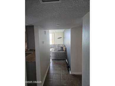 Escape to your own coastal sanctuary in this beautiful on Oceans Golf Club in Florida - for sale on GolfHomes.com, golf home, golf lot