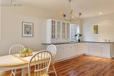 Exquisitely located on the edge of 22 acres of HOA owned forest on The Ridge At Castle Pines North in Colorado - for sale on GolfHomes.com, golf home, golf lot