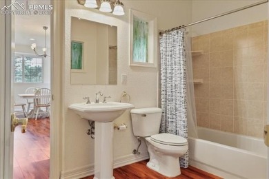 Exquisitely located on the edge of 22 acres of HOA owned forest on The Ridge At Castle Pines North in Colorado - for sale on GolfHomes.com, golf home, golf lot