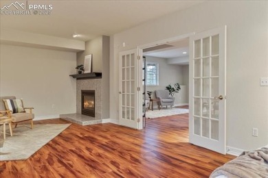 Exquisitely located on the edge of 22 acres of HOA owned forest on The Ridge At Castle Pines North in Colorado - for sale on GolfHomes.com, golf home, golf lot