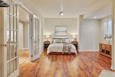 Exquisitely located on the edge of 22 acres of HOA owned forest on The Ridge At Castle Pines North in Colorado - for sale on GolfHomes.com, golf home, golf lot