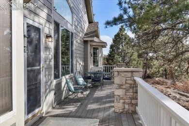 Exquisitely located on the edge of 22 acres of HOA owned forest on The Ridge At Castle Pines North in Colorado - for sale on GolfHomes.com, golf home, golf lot