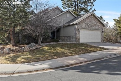 Exquisitely located on the edge of 22 acres of HOA owned forest on The Ridge At Castle Pines North in Colorado - for sale on GolfHomes.com, golf home, golf lot