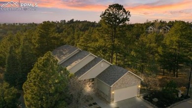 Exquisitely located on the edge of 22 acres of HOA owned forest on The Ridge At Castle Pines North in Colorado - for sale on GolfHomes.com, golf home, golf lot