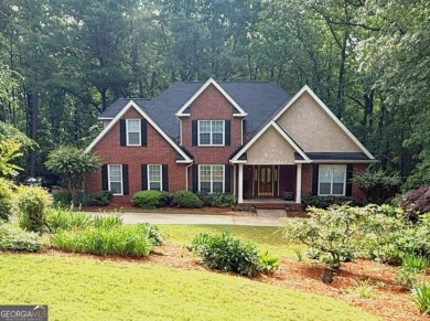 Beautiful brick home located within one mile of Cannongate Golf on Canongate Golf Club in Georgia - for sale on GolfHomes.com, golf home, golf lot
