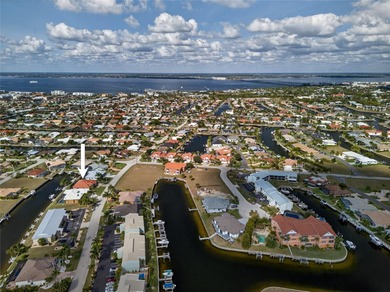 PUNTA GORDA ISLES!! BEAUTIFUL 3 BEDROOM PLUS DEN, 2 BATH, 3 CAR on Saint Andrews South Golf Club in Florida - for sale on GolfHomes.com, golf home, golf lot