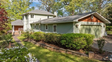 Waterfront living at its finest with this gorgeous 4-bedroom on River Golf and Country Club at Lake Royale in North Carolina - for sale on GolfHomes.com, golf home, golf lot