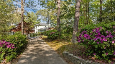 Waterfront living at its finest with this gorgeous 4-bedroom on River Golf and Country Club at Lake Royale in North Carolina - for sale on GolfHomes.com, golf home, golf lot