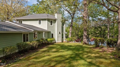Waterfront living at its finest with this gorgeous 4-bedroom on River Golf and Country Club at Lake Royale in North Carolina - for sale on GolfHomes.com, golf home, golf lot