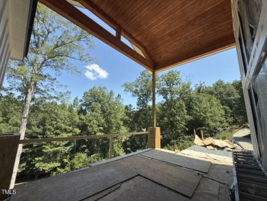 A rare fusion of timeless architecture and elevated design, this on Governors Club in North Carolina - for sale on GolfHomes.com, golf home, golf lot