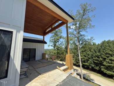 A rare fusion of timeless architecture and elevated design, this on Governors Club in North Carolina - for sale on GolfHomes.com, golf home, golf lot