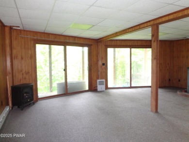 CLASSIC LAKE WALLENPAUPACK PROW FRONT CHALET IN BEAUTIFUL on Paupack Hills Golf and Country Club in Pennsylvania - for sale on GolfHomes.com, golf home, golf lot