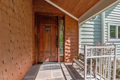 Waterfront living at its finest with this gorgeous 4-bedroom on River Golf and Country Club at Lake Royale in North Carolina - for sale on GolfHomes.com, golf home, golf lot