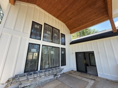 A rare fusion of timeless architecture and elevated design, this on Governors Club in North Carolina - for sale on GolfHomes.com, golf home, golf lot