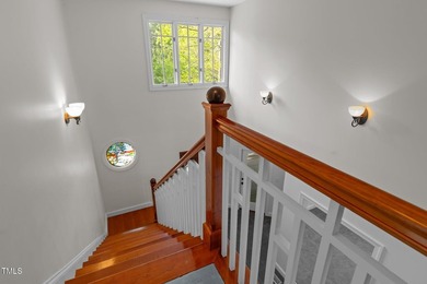 Waterfront living at its finest with this gorgeous 4-bedroom on River Golf and Country Club at Lake Royale in North Carolina - for sale on GolfHomes.com, golf home, golf lot