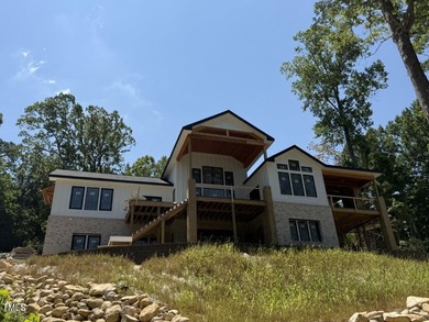 A rare fusion of timeless architecture and elevated design, this on Governors Club in North Carolina - for sale on GolfHomes.com, golf home, golf lot
