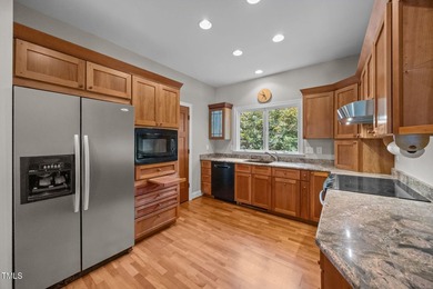 Waterfront living at its finest with this gorgeous 4-bedroom on River Golf and Country Club at Lake Royale in North Carolina - for sale on GolfHomes.com, golf home, golf lot