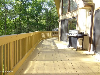 CLASSIC LAKE WALLENPAUPACK PROW FRONT CHALET IN BEAUTIFUL on Paupack Hills Golf and Country Club in Pennsylvania - for sale on GolfHomes.com, golf home, golf lot