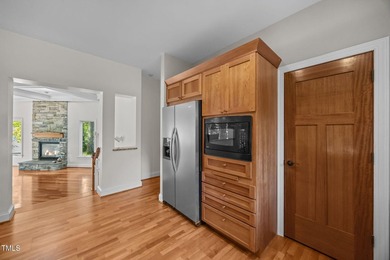 Waterfront living at its finest with this gorgeous 4-bedroom on River Golf and Country Club at Lake Royale in North Carolina - for sale on GolfHomes.com, golf home, golf lot