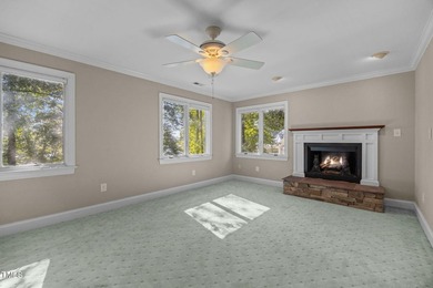 Waterfront living at its finest with this gorgeous 4-bedroom on River Golf and Country Club at Lake Royale in North Carolina - for sale on GolfHomes.com, golf home, golf lot