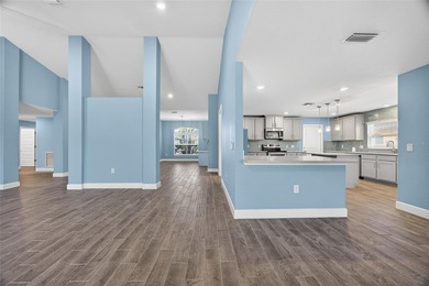 DEEP CREEK! Updated 4-bedroom, 3-bath, oversized 2-car garage on Deep Creek Golf Club in Florida - for sale on GolfHomes.com, golf home, golf lot