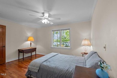 Waterfront living at its finest with this gorgeous 4-bedroom on River Golf and Country Club at Lake Royale in North Carolina - for sale on GolfHomes.com, golf home, golf lot