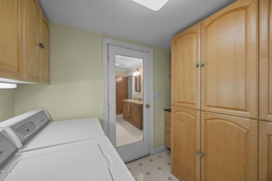 Waterfront living at its finest with this gorgeous 4-bedroom on River Golf and Country Club at Lake Royale in North Carolina - for sale on GolfHomes.com, golf home, golf lot