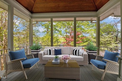 Waterfront living at its finest with this gorgeous 4-bedroom on River Golf and Country Club at Lake Royale in North Carolina - for sale on GolfHomes.com, golf home, golf lot