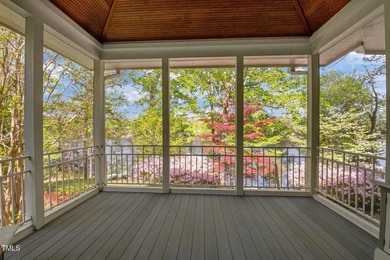 Waterfront living at its finest with this gorgeous 4-bedroom on River Golf and Country Club at Lake Royale in North Carolina - for sale on GolfHomes.com, golf home, golf lot