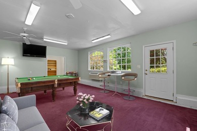 Waterfront living at its finest with this gorgeous 4-bedroom on River Golf and Country Club at Lake Royale in North Carolina - for sale on GolfHomes.com, golf home, golf lot