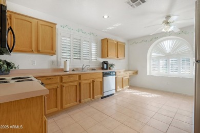 This lovingly kept home offers a bright and airy feel with fresh on Oakwood Golf Club  in Arizona - for sale on GolfHomes.com, golf home, golf lot