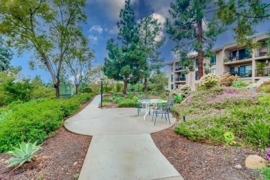 Unique, top-floor unit with views of the surrounding treetops on Mission Trails Golf Course in California - for sale on GolfHomes.com, golf home, golf lot