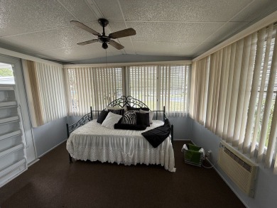 Located in the 55+ community of Rolling Greens Village in Ocala on Rolling Greens Executive Golf Community in Florida - for sale on GolfHomes.com, golf home, golf lot