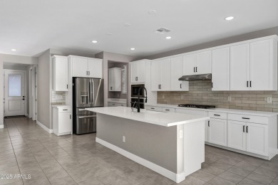 Discover this stunning Sawgrass floor plan home on the GOLF on Verrado Golf Club - Victory in Arizona - for sale on GolfHomes.com, golf home, golf lot