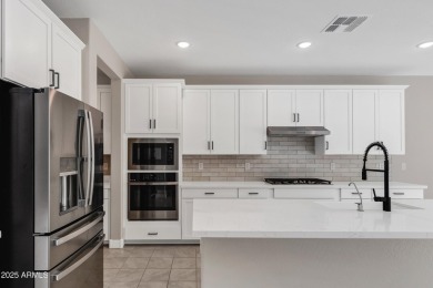Discover this stunning Sawgrass floor plan home on the GOLF on Verrado Golf Club - Victory in Arizona - for sale on GolfHomes.com, golf home, golf lot