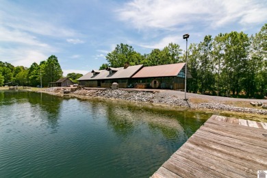 One of a kind 4 Bedroom log home with a privately owned 20 acre on Calvert City Golf and Country Club in Kentucky - for sale on GolfHomes.com, golf home, golf lot