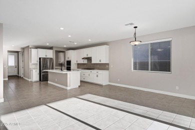Discover this stunning Sawgrass floor plan home on the GOLF on Verrado Golf Club - Victory in Arizona - for sale on GolfHomes.com, golf home, golf lot