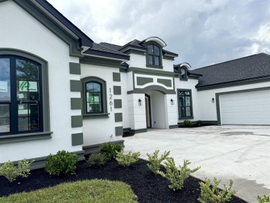 Welcome to 1261 Wood Stork Dr., a stunning new construction on Wild Wing Plantation in South Carolina - for sale on GolfHomes.com, golf home, golf lot
