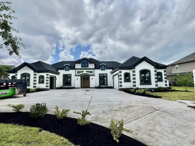 Welcome to 1261 Wood Stork Dr., a stunning new construction on Wild Wing Plantation in South Carolina - for sale on GolfHomes.com, golf home, golf lot