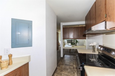 Located in the heart of Aiea, welcome to this spacious 2-bedroom on Pearl Country Club in Hawaii - for sale on GolfHomes.com, golf home, golf lot