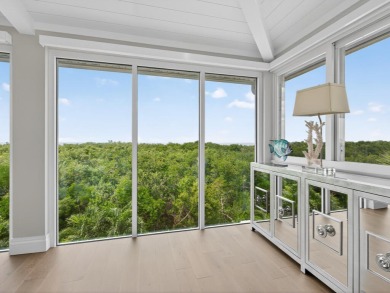 View, view, view! Experience modern luxury in this ''renovated on Hideaway Beach Golf Course in Florida - for sale on GolfHomes.com, golf home, golf lot