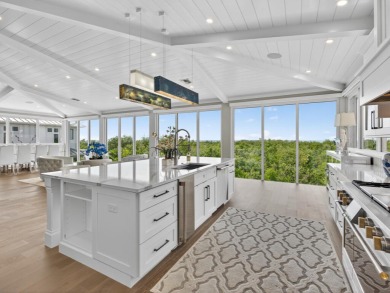 View, view, view! Experience modern luxury in this ''renovated on Hideaway Beach Golf Course in Florida - for sale on GolfHomes.com, golf home, golf lot