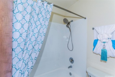 Located in the heart of Aiea, welcome to this spacious 2-bedroom on Pearl Country Club in Hawaii - for sale on GolfHomes.com, golf home, golf lot