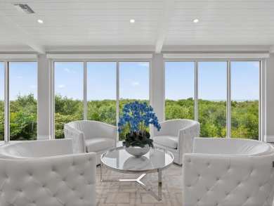 View, view, view! Experience modern luxury in this ''renovated on Hideaway Beach Golf Course in Florida - for sale on GolfHomes.com, golf home, golf lot