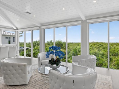 View, view, view! Experience modern luxury in this ''renovated on Hideaway Beach Golf Course in Florida - for sale on GolfHomes.com, golf home, golf lot