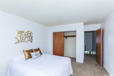 Located in the heart of Aiea, welcome to this spacious 2-bedroom on Pearl Country Club in Hawaii - for sale on GolfHomes.com, golf home, golf lot