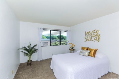 Located in the heart of Aiea, welcome to this spacious 2-bedroom on Pearl Country Club in Hawaii - for sale on GolfHomes.com, golf home, golf lot